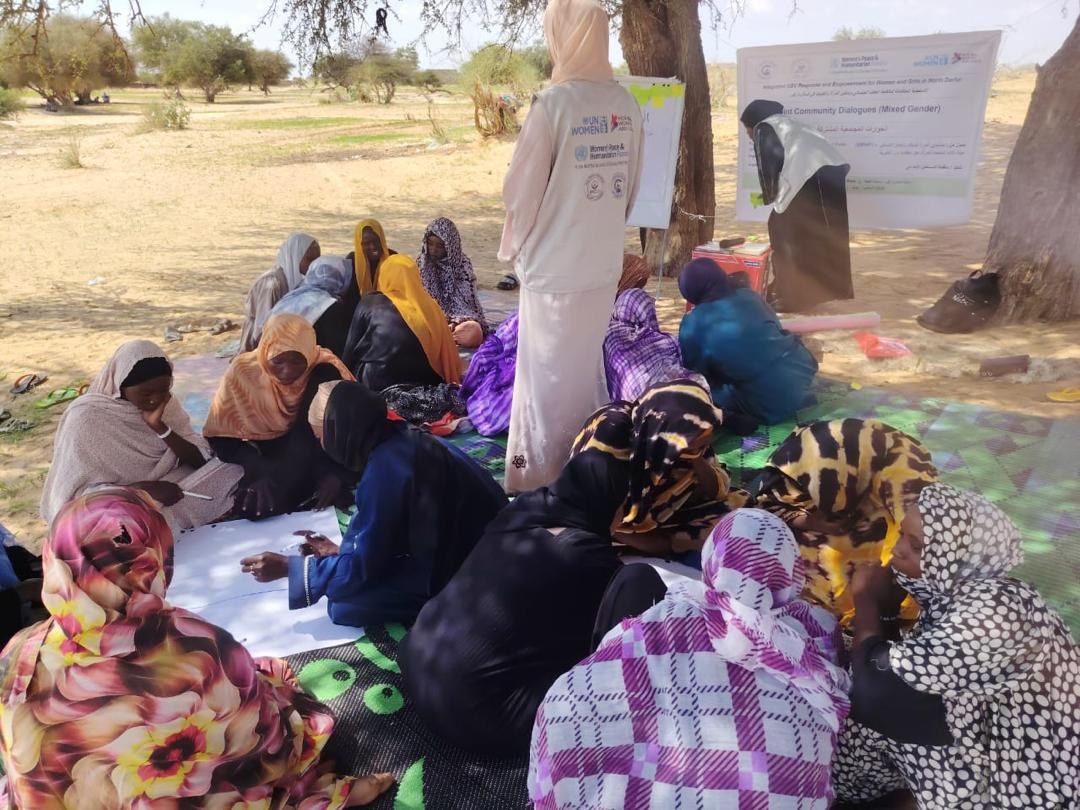 Women and girls in a facilitated training session